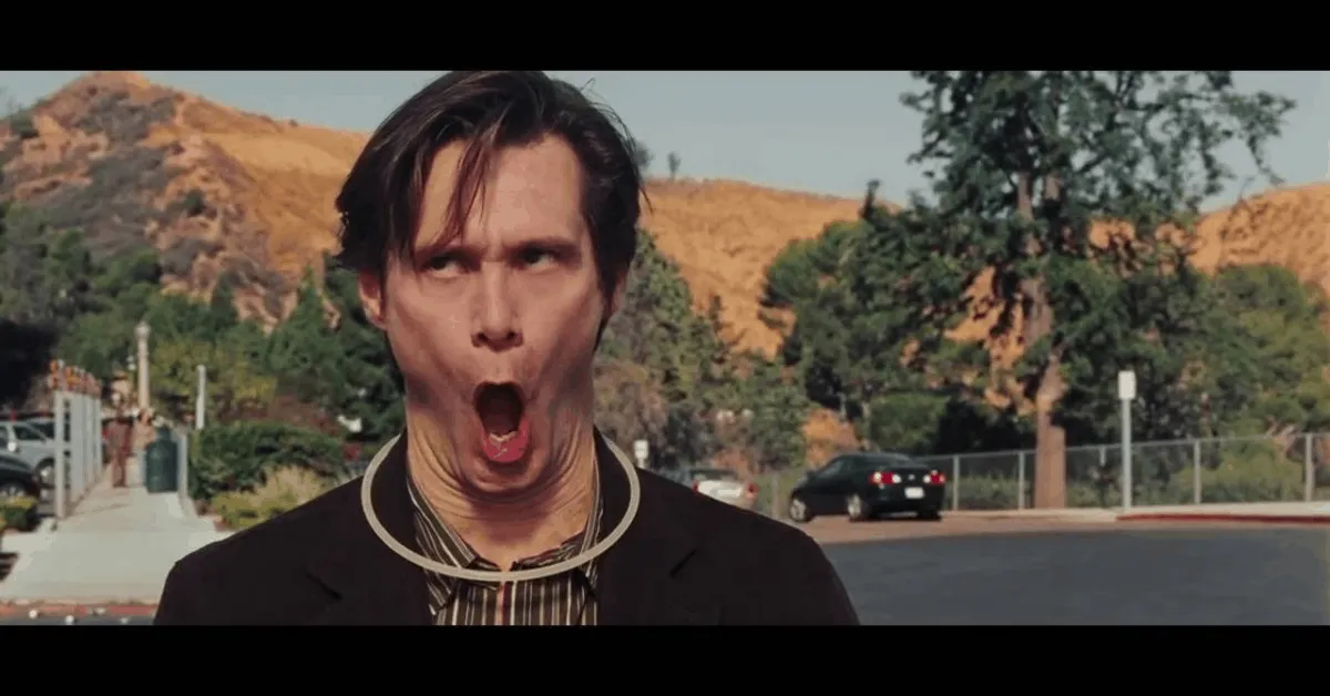 Carl Allen shouting yes on a roadside in Yes Man